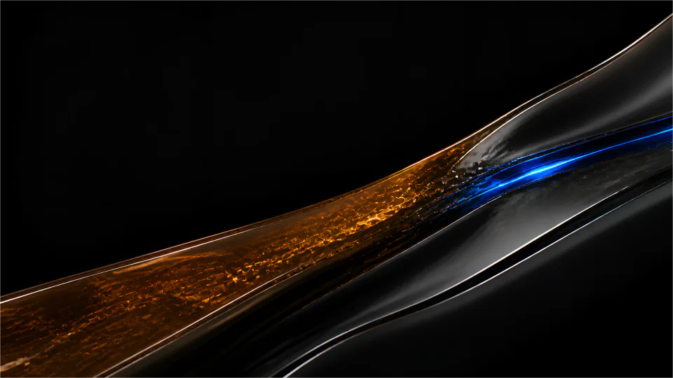 Cobalt light is caught between obsidian chrome and molten amber resin.